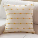 Almofada decorativa para sofá com riscas bordadas